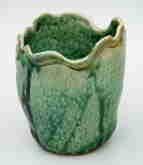 pinch pot with design at rim, 6" high, 